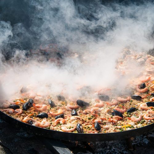 Cooking paella in large pot